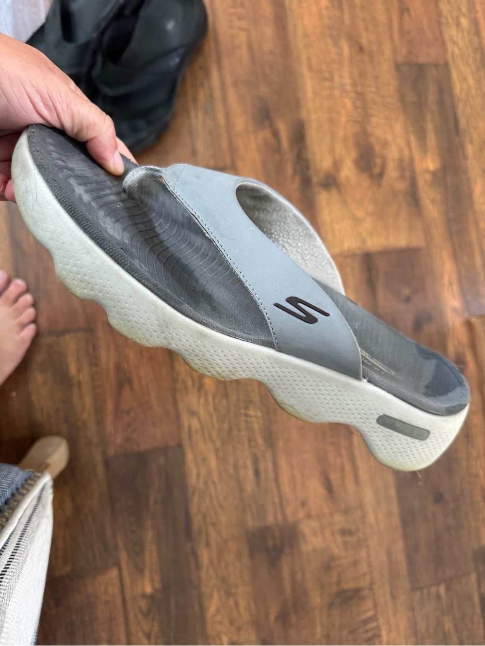 Two Skechers Light Gray and Black Foam Slide Sandal